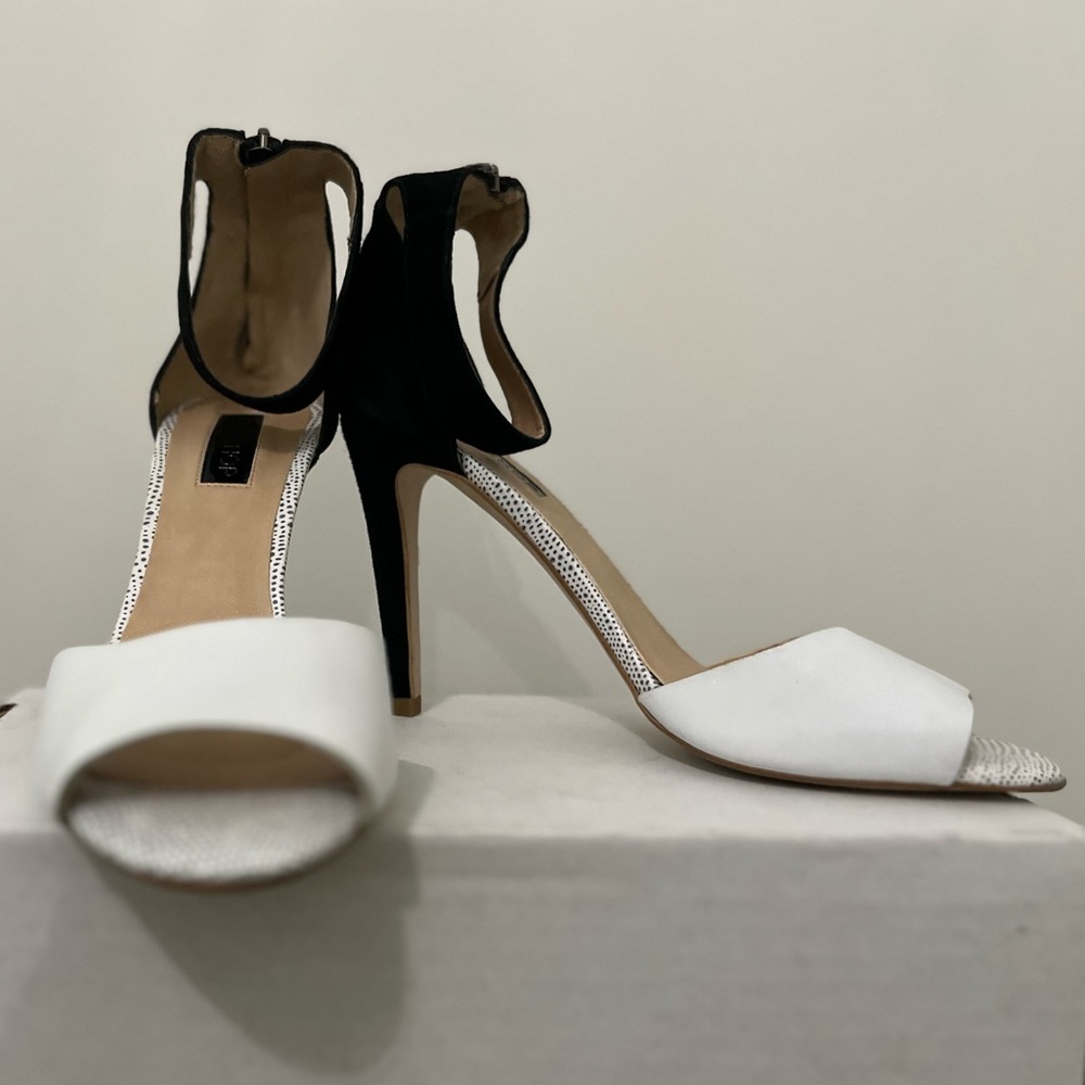 Topshop black and white leather ankle strap heels.